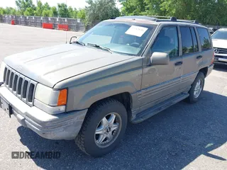 1996 Jeep Grand Cherokee Limited with VIN 1J4GZ78Y1TC162546, listed as a IAAI auction lot 42612646 with 204,098 mi miles and . Bid and sale history available at DreamBid. Image 2.