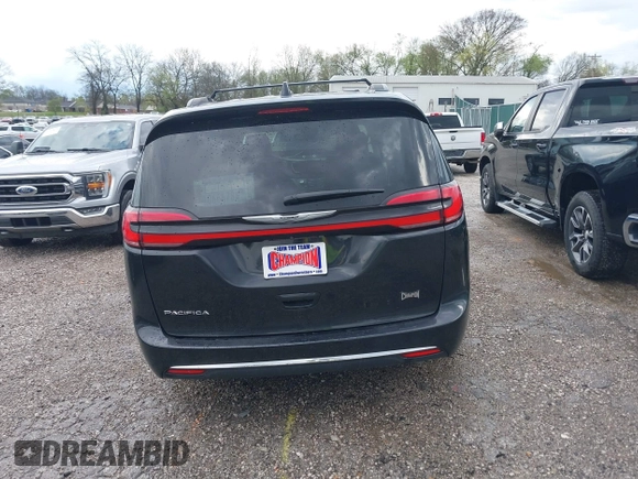2022 Chrysler Pacifica Touring L with VIN 2C4RC1BG9NR194782, listed as a IAAI auction lot 41842410 with 76,231 mi miles and . Bid and sale history available at DreamBid. Image 16.