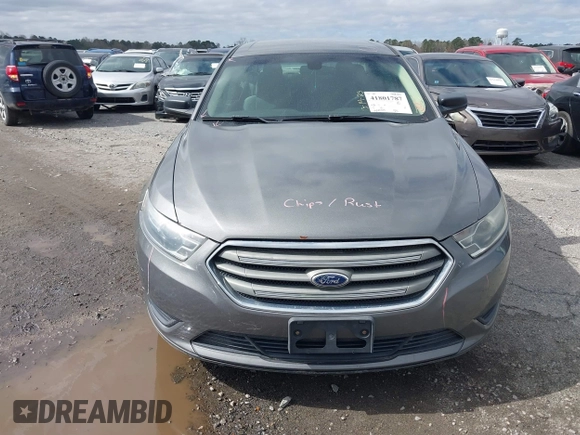 2014 Ford Taurus SE z VIN 1FAHP2D88EG143275, wystawiony jako IAAI lot #41801787 z przebiegiem 150 988 mil mil oraz . Historia ofert i sprzedaży dostępna na DreamBid. Obrazek 13.