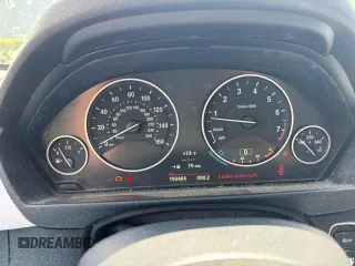 2013 BMW 3 Series 328i xDrive with VIN WBA3B5G57DNS00448, listed as a Copart auction lot 63165005 with 190,464 mi miles and Clean title. Bid and sale history available at DreamBid. Image 8.