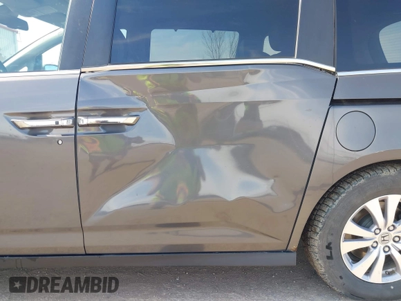 2014 Honda Odyssey EX-L z VIN 5FNRL5H64EB031426, wystawiony jako IAAI lot #41777542 z przebiegiem 162 426 mil mil oraz . Historia ofert i sprzedaży dostępna na DreamBid. Obrazek 6.