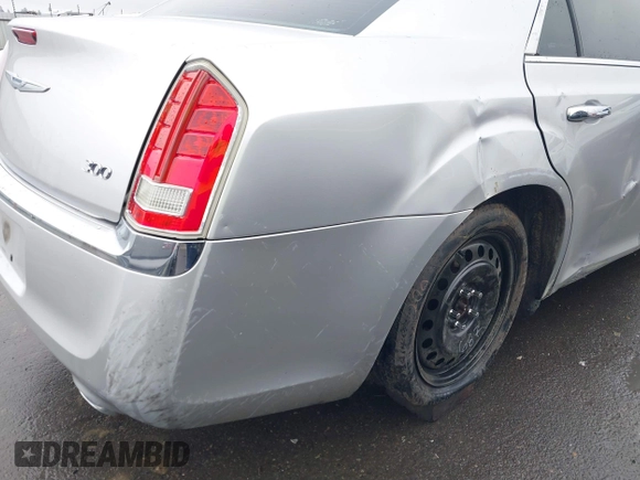 2011 Chrysler 300 Limited with VIN 2C3CA5CG9BH614354, listed as a IAAI auction lot 41216730 with 141,670 mi miles. Bid and sale history available at carsss.com. Image 21.