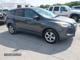 2015 Ford Escape SE with VIN 1FMCU0G7XFUA89965, listed as a IAAI auction lot 42072553 with 129,877 mi miles. Bid and sale history available at carsss.com. Image 1.