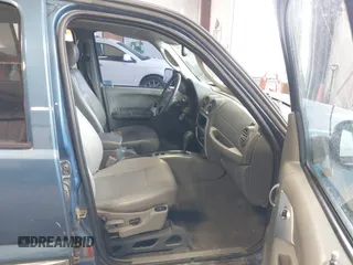 2004 Jeep Liberty Limited with VIN 1J4GK58K84W226666, listed as a IAAI auction lot 41764238 with 148,664 mi miles. Bid and sale history available at carsss.com. Image 5.