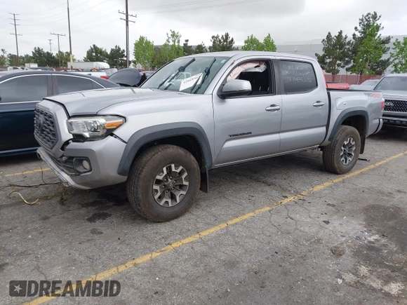 2021 Toyota Tacoma SR z VIN 3TMCZ5AN3MM374132, wystawiony jako IAAI lot #42068562 z przebiegiem 38 654 mil mil oraz . Historia ofert i sprzedaży dostępna na DreamBid. Obrazek 2.