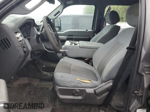2014 Ford F-250 XL with VIN 1FT7W2B60EEA33908, listed as a Copart auction lot 54752765 with 215,428 mi miles and Salvage title. Bid and sale history available at DreamBid. Image 7.