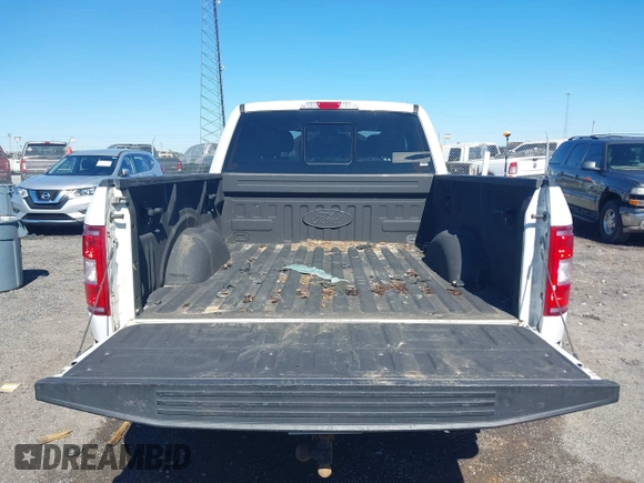 2018 Ford F-150 XL with VIN 1FTEX1EP9JFB83992, listed as a IAAI auction lot 41655741 with 174,796 mi miles and . Bid and sale history available at DreamBid. Image 12.