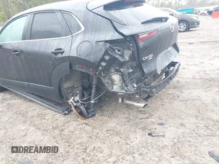 2020 Mazda CX-30 Select with VIN 3MVDMBCL3LM104988, listed as a IAAI auction lot 41951565 with 53,685 mi miles and . Bid and sale history available at DreamBid. Image 6.