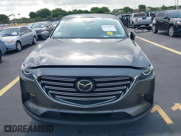 2021 Mazda CX-9 Touring с VIN JM3TCACY4M0511512, выставлен на аукционе IAAI как лот 42376544 с пробегом 50 485 миль миль и . История ставок и продаж доступна на DreamBid. Изображение 12.