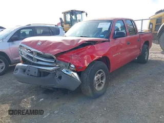 2000 Dodge Dakota Sport with VIN 1B7GL2AN0YS705134, listed as a IAAI auction lot 41997957 with 219,659 mi miles. Bid and sale history available at carsss.com. Image 2.