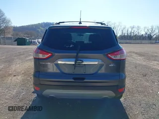 2015 Ford Escape SE with VIN 1FMCU9G97FUA89251, listed as a IAAI auction lot 41919240 with 148,472 mi miles and . Bid and sale history available at DreamBid. Image 16.