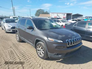 2014 Jeep Cherokee Latitude with VIN 1C4PJLCS4EW148960, listed as a IAAI auction lot 41111496 with 177,819 mi miles. Bid and sale history available at carsss.com. Image 1.