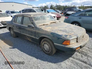 1993 Plymouth Acclaim z VIN 1P3XA4634PF673210, wystawiony jako Copart lot #75919254 z przebiegiem 186 440 mil mil oraz Szkody całkowita. Historia ofert i sprzedaży dostępna na DreamBid. Obrazek 4.