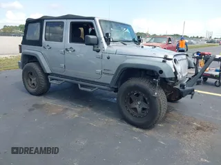 2014 Jeep Wrangler Unlimited Sport with VIN 1C4BJWDG5EL105669, listed as a IAAI auction lot 42638792 with 93,100 mi miles and . Bid and sale history available at DreamBid. Image 1.
