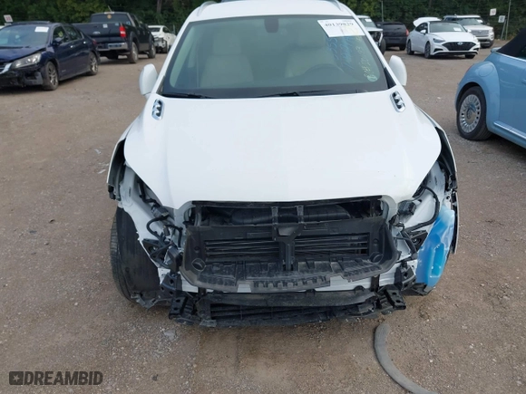 2020 Buick Envision Essence with VIN LRBFXCSA4LD150105, listed as a IAAI auction lot 40139829 with 26,982 mi miles. Bid and sale history available at carsss.com. Image 6.