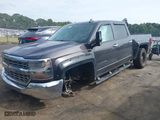 2016 Chevrolet Silverado 1500 LT with VIN 3GCUKREC7GG164225, listed as a IAAI auction lot 40288348 with 162,672 mi miles. Bid and sale history available at carsss.com. Image 2.