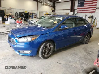 2018 Ford Focus SE z VIN 1FADP3FE2JL332464, wystawiony jako Copart lot #55649215 z przebiegiem 95 541 mil mil oraz Czysty tytuł • Clean title. Historia ofert i sprzedaży dostępna na DreamBid. Obrazek 1.