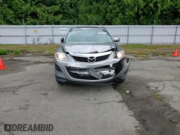 2011 Mazda CX-9 Touring with VIN JM3TB3CV7B0326839, listed as a Copart auction lot 57061345 with 111,832 mi miles and Salvage title. Bid and sale history available at DreamBid. Image 14.