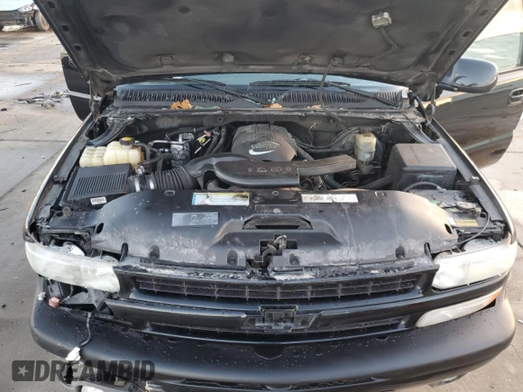 2001 Chevrolet Suburban LS z VIN 3GNFK16T91G221421, wystawiony jako Copart lot #87094634 z przebiegiem 186 977 mil mil oraz Szkoda całkowita • Salvage title. Historia ofert i sprzedaży dostępna na DreamBid. Obrazek 13.