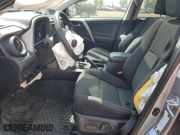 2016 Toyota RAV4 XLE with VIN 2T3RFREV9GW439315, listed as a Copart auction lot 59704345 with 143,198 mi miles and Salvage title. Bid and sale history available at DreamBid. Image 7.