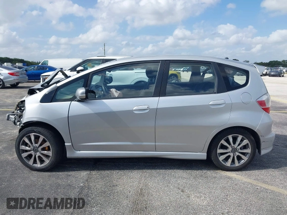 2012 Honda Fit Sport with VIN JHMGE8H5XCC034799, listed as a IAAI auction lot 41957184 with 86,373 mi miles. Bid and sale history available at carsss.com. Image 13.