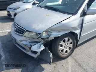 2004 Honda Odyssey EX with VIN 5FNRL18684B143038, listed as a IAAI auction lot 42083469 with 160,317 mi miles and . Bid and sale history available at DreamBid. Image 6.