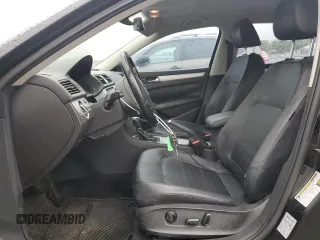 2012 Volkswagen Passat SE z VIN 1VWBH7A3XCC009775, wystawiony jako Copart lot #56469285 z przebiegiem 145 265 mil mil oraz Szkoda całkowita • Salvage title. Historia ofert i sprzedaży dostępna na DreamBid. Obrazek 7.
