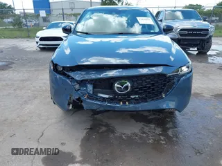 2024 Mazda CX-5 S Carbon Edition with VIN JM3KFBCL3R0505477, listed as a IAAI auction lot 42245851 with 17,954 mi miles and . Bid and sale history available at DreamBid. Image 6.