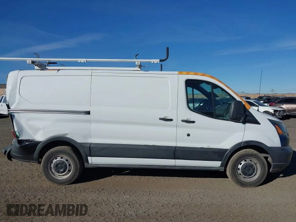 2016 Ford Transit Cargo z VIN 1FTYE1YM2GKB18602, wystawiony jako IAAI lot #41091180 z przebiegiem 143 262 mil mil oraz . Historia ofert i sprzedaży dostępna na DreamBid. Obrazek 13.