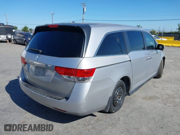 2014 Honda Odyssey EX-L with VIN 5FNRL5H63EB041106, listed as a IAAI auction lot 42294113 with 122,610 mi miles and . Bid and sale history available at DreamBid. Image 4.