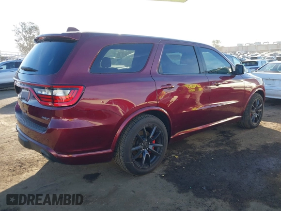 2019 Dodge Durango SRT with VIN 1C4SDJGJXKC556870, listed as a IAAI auction lot 41125324 with 16,857 mi miles and . Bid and sale history available at DreamBid. Image 4.