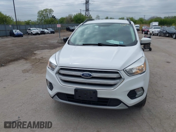 2018 Ford Escape SE z VIN 1FMCU9GDXJUC99453, wystawiony jako IAAI lot #42195202 z przebiegiem 191 840 mil mil oraz . Historia ofert i sprzedaży dostępna na DreamBid. Obrazek 12.