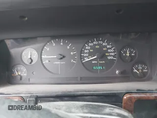1997 Jeep Grand Cherokee Laredo with VIN 1J4GZ58Y8VC624804, listed as a IAAI auction lot 41736324 with 165,851 mi miles. Bid and sale history available at carsss.com. Image 7.