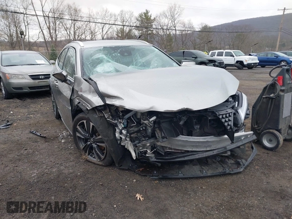 2019 Lexus UX 250h z VIN JTHU9JBH9K2008345, wystawiony jako IAAI lot #42019642 z przebiegiem Nie podano mil oraz . Historia ofert i sprzedaży dostępna na DreamBid. Obrazek 6.