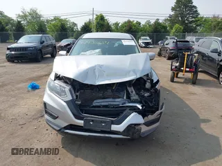 2017 Nissan Rogue SV with VIN KNMAT2MV7HP565670, listed as a IAAI auction lot 42435654 with 99,114 mi miles and . Bid and sale history available at DreamBid. Image 12.