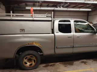 2005 Toyota Tundra SR5 with VIN 5TBBT44115S460209, listed as a IAAI auction lot 41979337 with 207,990 mi miles. Bid and sale history available at carsss.com. Image 13.