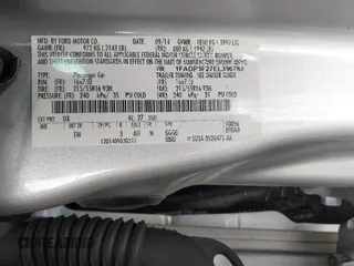 2014 Ford Focus SE with VIN 1FADP3F27EL396785, listed as a IAAI auction lot 42113377 with 147,851 mi miles. Bid and sale history available at carsss.com. Image 9.