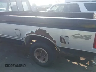 1996 Ford F-150 with VIN 1FTEX14H0TKA49456, listed as a IAAI auction lot 42689128 with 243,331 mi miles and . Bid and sale history available at DreamBid. Image 14.