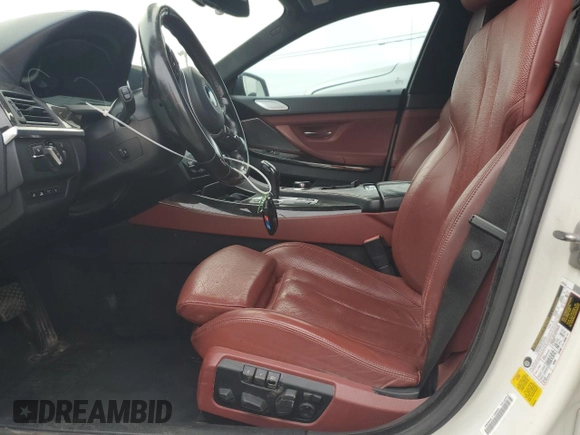 2017 BMW 6 Series 650i with VIN WBA6D4C54HD977706, listed as a Copart auction lot 79116554 with 87,039 mi miles and Salvage Title. Bid and sale history available at carsss.com. Image 7.
