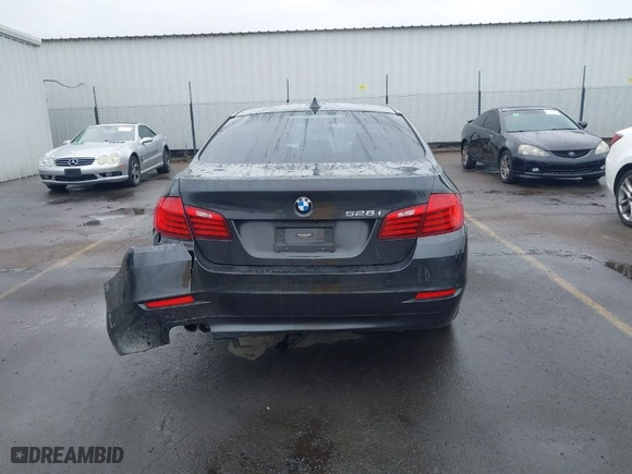 2014 BMW 5 Series 528i with VIN WBA5A5C5XED512448, listed as a IAAI auction lot 41559871 with 145,383 mi miles. Bid and sale history available at carsss.com. Image 17.