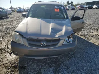 2001 Mazda Tribute LX with VIN 4F2CU08151KM28828, listed as a Copart auction lot 47933495 with 241,901 mi miles and Non Repairable. Bid and sale history available at carsss.com. Image 5.