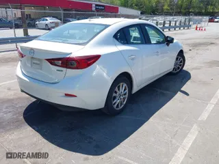 2016 Mazda Mazda3 i Grand Touring with VIN JM1BM1X79G1319469, listed as a IAAI auction lot 41929229 with 121,883 mi miles. Bid and sale history available at carsss.com. Image 4.