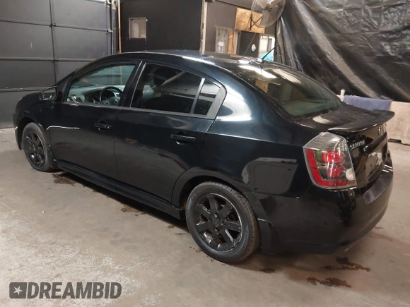 2011 Nissan Sentra SR with VIN 3N1AB6AP8BL647168, listed as a IAAI auction lot 40694237 with 135,622 mi miles and . Bid and sale history available at DreamBid. Image 3.