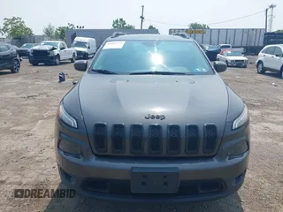2016 Jeep Cherokee Latitude with VIN 1C4PJMCBXGW122274, listed as a IAAI auction lot 42407175 with 152,229 mi miles and . Bid and sale history available at DreamBid. Image 12.