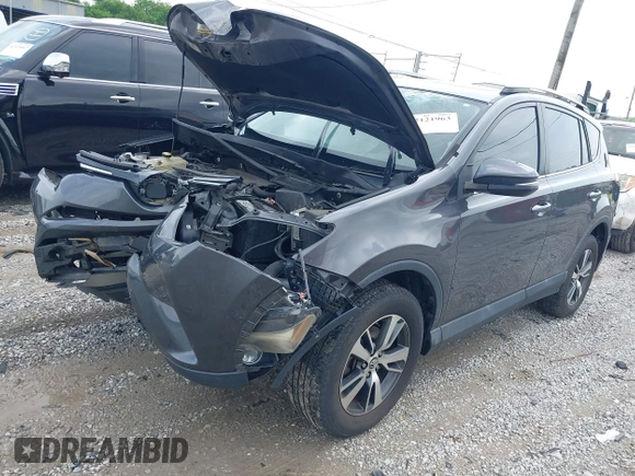 2018 Toyota RAV4 XLE z VIN 2T3WFREV8JW429188, wystawiony jako IAAI lot #42121963 z przebiegiem 133 462 mil mil oraz . Historia ofert i sprzedaży dostępna na DreamBid. Obrazek 17.