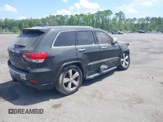 2015 Jeep Grand Cherokee Overland with VIN 1C4RJFCT9FC859740, listed as a IAAI auction lot 42187933 with 231,481 mi miles. Bid and sale history available at carsss.com. Image 4.