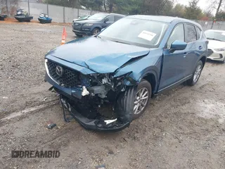 2023 Mazda CX-5 S Carbon Edition z VIN JM3KFBCM4P0264891, wystawiony jako IAAI lot #40933700 z przebiegiem 18 714 mil mil oraz . Historia ofert i sprzedaży dostępna na DreamBid. Obrazek 18.