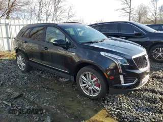 2023 Cadillac XT5 AWD Sport with VIN 1GYKNGRS6PZ131182, listed as a Copart auction lot 49907105 with 38,734 mi miles and Salvage title. Bid and sale history available at DreamBid. Image 4.
