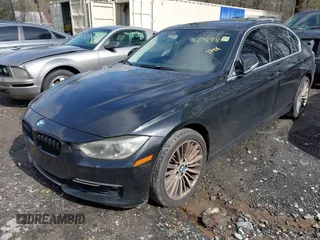 2013 BMW 3 Series 328i with VIN WBA3C1G50DNR49064, listed as a IAAI auction lot 41584598 with 179,034 mi miles. Bid and sale history available at carsss.com. Image 2.