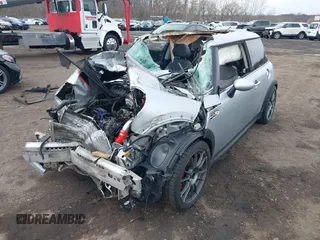 2006 MINI Hardtop S with VIN WMWRE33546TL23876, listed as a IAAI auction lot 41858060 with 146,359 mi miles and . Bid and sale history available at DreamBid. Image 6.